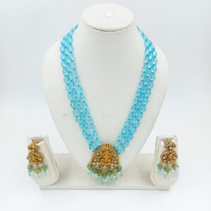 ARNAS VICTORIAN AD STONE LAKSHMI PENDANT – DANGLER EARRINGS BLUE JEWELLERY SET