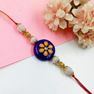 ARNAS 1 PC BLUE ROUND MOTIF ART METAL DESIGNER RAKHI