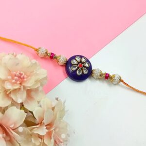 ARNAS 1 PC BLUE ROUND MOTIF ART METAL DESIGNER RAKHI