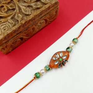 ARNAS 1 PC ORANGE AGATE BEAD DESIGNER GREEN & SILVER KUNDAN RAKHI