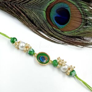 ARNAS 1 PC PEACOCK FEATHER MOTIF KUNDAN WITH LOOK ALIKE PEARL DESIGNER RAKHI