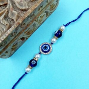 ARNAS 1 PC BLUE ROUND MOTIF EVIL EYE CHARMS DESIGNER RAKHI