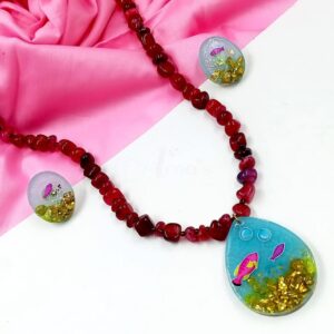 ARNAS COMBO SET OF SKY BLUE RESIN DROP MOTIF PENDANT & EARRINGS WITH AQUARIUM DESIGN