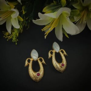 ARNAS 1 PAIR PACK OF GOLDEN BRASS METAL WITH MAGENTA STONE DESIGNER MOTIVE EARRING